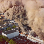 After a fire broke out at a cold storage container quickly the situation escalted resulting in huge smoke development.