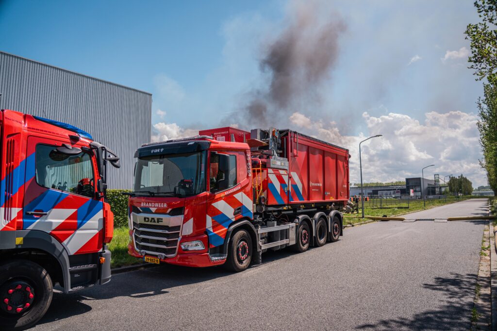 Conteneur Hytrans Hoselayer et SqueezeRamp
